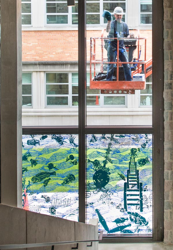 Jim Cogswell working on the connector windows