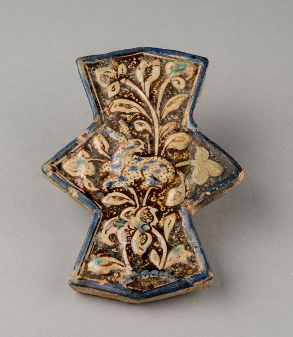 Tile with rabbit motif