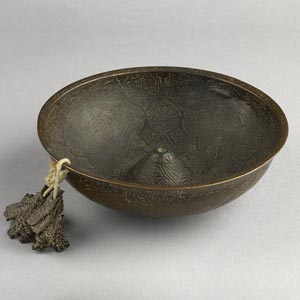 Magic bowl with attached prayer tablets