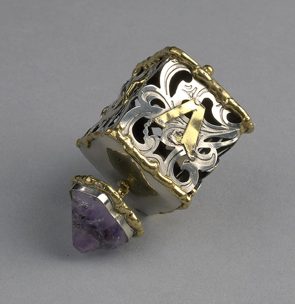 Gold, silver, and amethyst dreidel